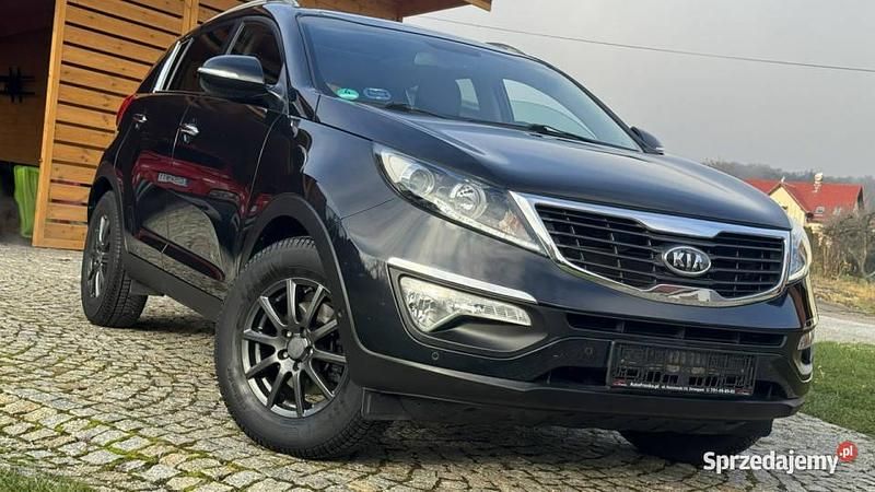 Czarny metalik Używany 2012 Kia Sportage SUV | 38 900 zł (Uczciwa cena) - Obraz 1/4