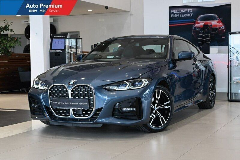 Niebieski (metalik) Używany 2021 BMW 418 Coupe | 169 900 zł - Obraz 1/4