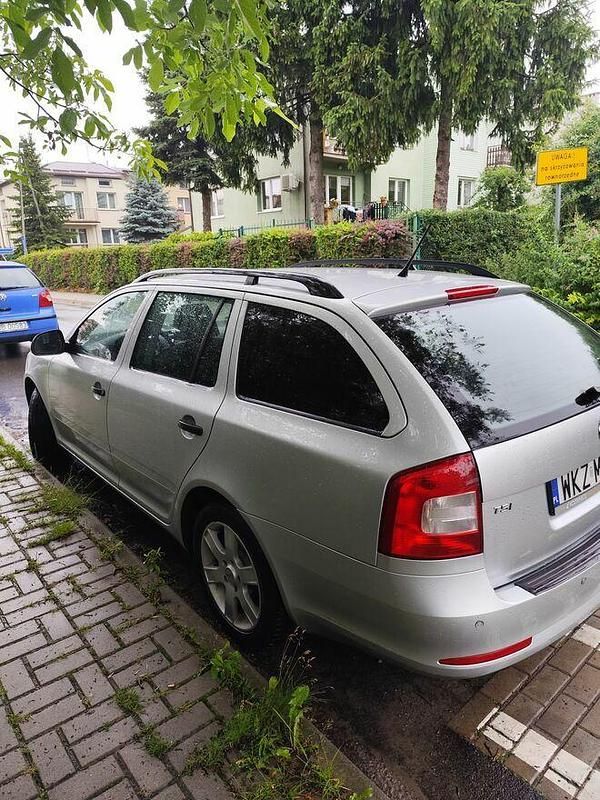 Używany Skoda Octavia 122 KM (89 kW) 2012 Srebrny Kombi