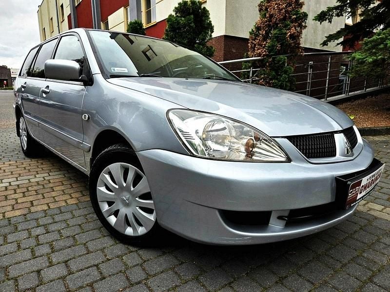 Srebrny (metalik) Używany 2006 Mitsubishi Lancer Kombi | 8999 zł - Obraz 1/4