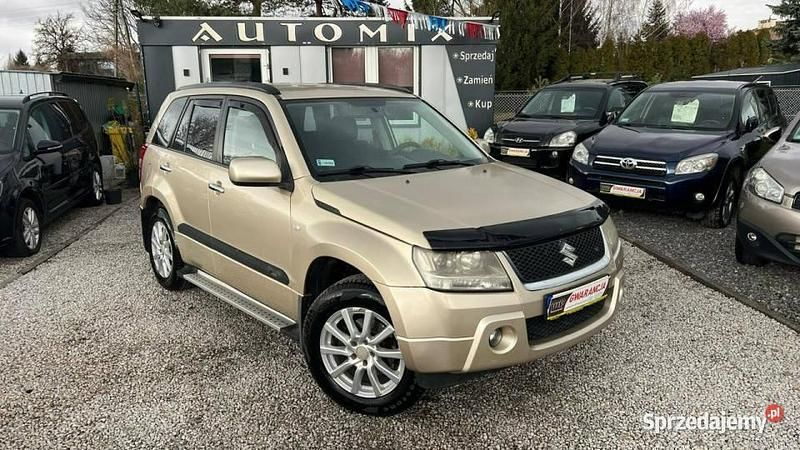 Złoty Używany 2006 Suzuki Grand Vitara SUV | 24 700 zł (Dobra cena) - Obraz 1/2