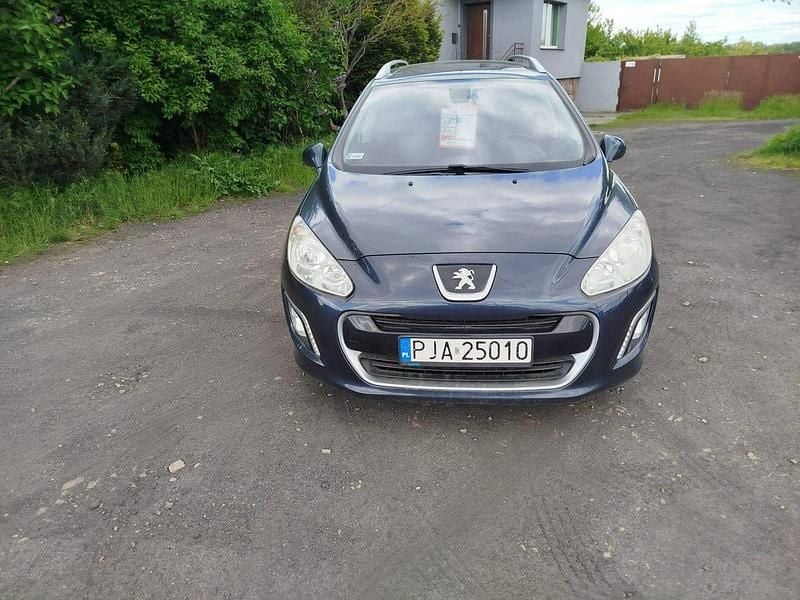 Używany Peugeot 308 SW 112 KM (82 kW) 2011 Niebieski Kombi