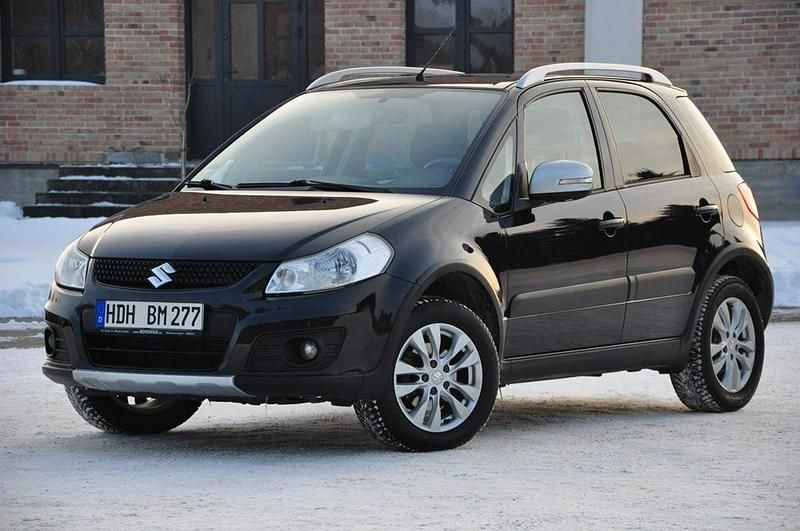 Używany Suzuki SX4 120 KM (88 kW) 2014 Czarny (metalik) Sedan/Limuzyna