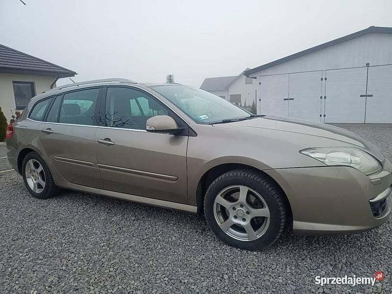 Używany Renault Laguna III 140 KM (102 kW) 2009 Beżowy Kombi