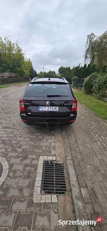 Brązowy Używany 2014 Skoda Superb Kombi | 42 500 zł (Uczciwa cena) - Obraz 1/4
