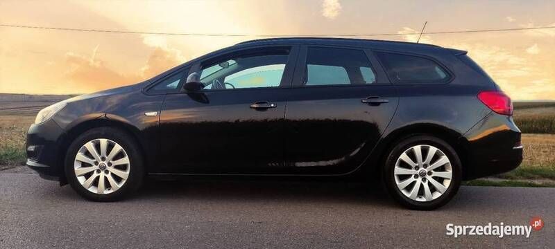 Czarny Używany 2015 Opel Astra Sedan/Limuzyna | 33 500 zł (Uczciwa cena) - Obraz 1/4