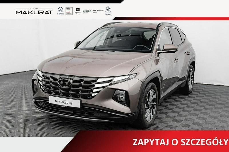 Brązowy Używany 2022 Hyundai Tucson SUV | 108 850 zł (Drogi) - Obraz 1/4
