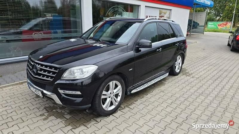 Czarny Używany 2011 Mercedes ML320 SUV | 42 400 zł - Obraz 1/4