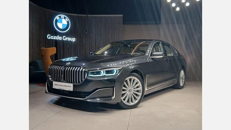 Szary sophisto z brylantowym połyskiem metalizowany Używany 2021 BMW 740L Sedan/Limuzyna | 229 900 zł - Obraz 1/3
