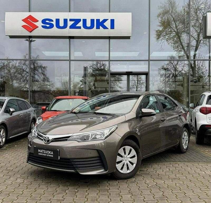 Używany Toyota Corolla 132 KM (97 kW) 2018 Brązowy (metalik) Sedan/Limuzyna
