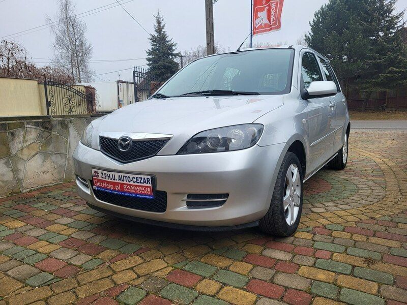 Srebrny (metalik) Używany 2006 Mazda 2 Hatchback | 6900 zł (Uczciwa cena) - Obraz 1/4