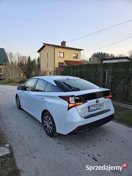 Biały Używany 2021 Toyota Prius Hatchback | 79 600 zł (Uczciwa cena) - Obraz 1/4