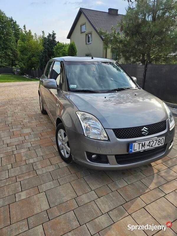 Srebrny Używany 2007 Suzuki Swift Sedan/Limuzyna | 12 500 zł (Uczciwa cena) - Obraz 1/4