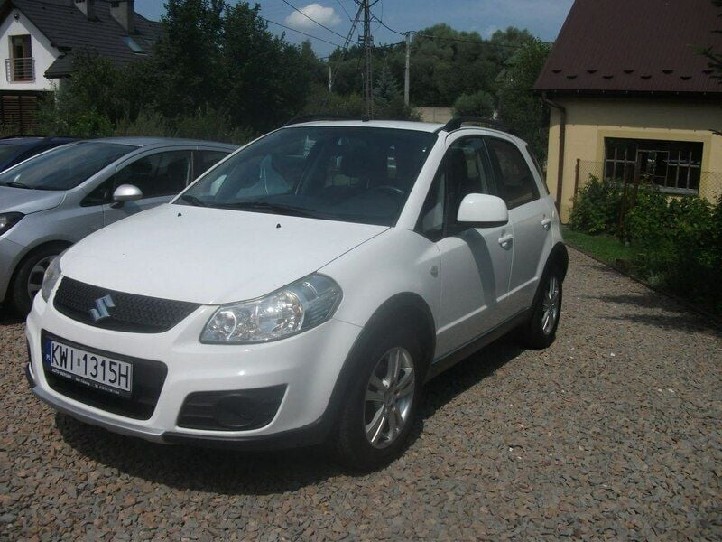 Biały Używany 2010 Suzuki SX4 Minivan | 23 900 zł (Drogi) - Obraz 1/4