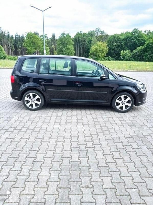 Czarny Używany 2011 VW Touran Minivan | 22 499 zł (Uczciwa cena) - Obraz 1/4