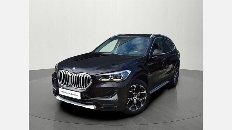 Brązowy połyskujący metalizowany Używany 2021 BMW X1 Performance SUV | 104 900 zł (Uczciwa cena) - Obraz 1/3