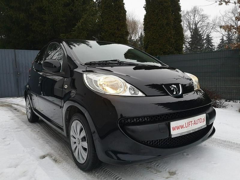 Używany Peugeot 107 66 KM (48 kW) 2008 Czarny Hatchback