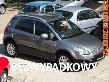 Szary Używany 2013 Fiat Sedici SUV | 41 500 zł - Obraz 1/4