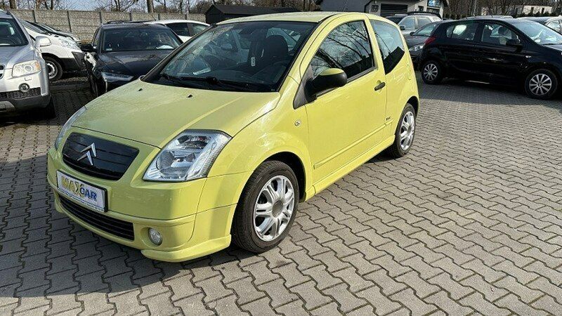 Żółty Używany 2007 Citroën C2 VTR Sport Hatchback | 10 900 zł - Obraz 1/4