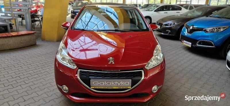 Czerwony Używany 2014 Peugeot 208 Hatchback | 24 900 zł (Uczciwa cena) - Obraz 1/2