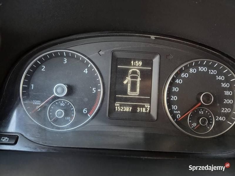 Używany VW Caddy 102 KM (75 kW) 2012 Biały Minivan