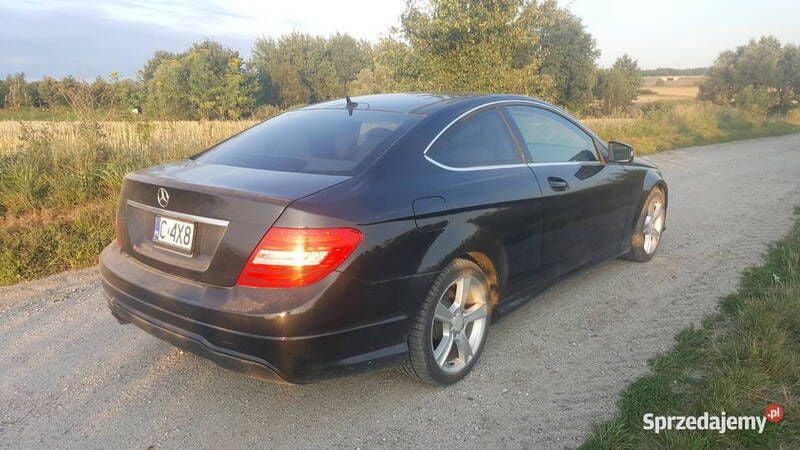 Czarny Używany 2012 Mercedes C250 AMG Coupe | 47 000 zł - Obraz 1/4