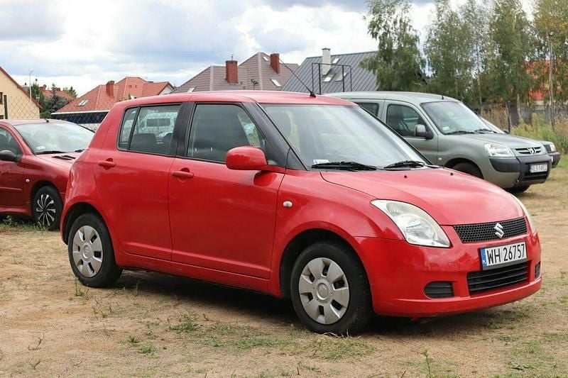 Czerwony Używany 2006 Suzuki Swift Hatchback | 10 000 zł (Uczciwa cena) - Obraz 1/3