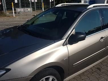 Beżowy Używany 2011 Renault Laguna III Bose Edition Kombi | 19 999 zł (Uczciwa cena) - Obraz 1/4