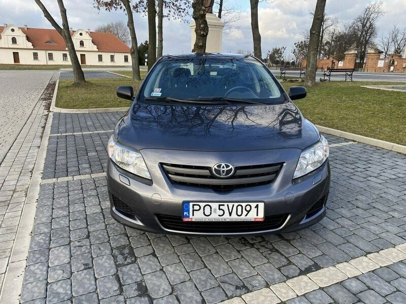 Używany Toyota Corolla 124 KM (91 kW) 2007 Szary Sedan/Limuzyna