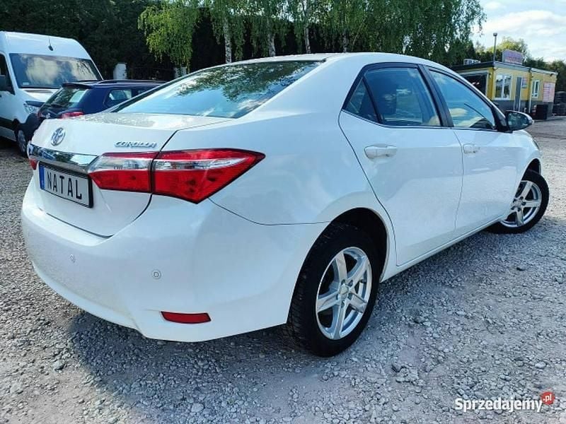 Biały Używany 2014 Toyota Corolla Sedan/Limuzyna | 33 400 zł (Dobra cena) - Obraz 1/4