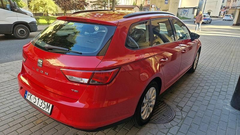 Czerwony Używany 2014 Seat Leon Kombi | 25 999 zł (Uczciwa cena) - Obraz 1/4