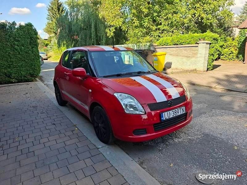 Czerwony Używany 2007 Suzuki Swift Hatchback | 10 500 zł (Uczciwa cena) - Obraz 1/4