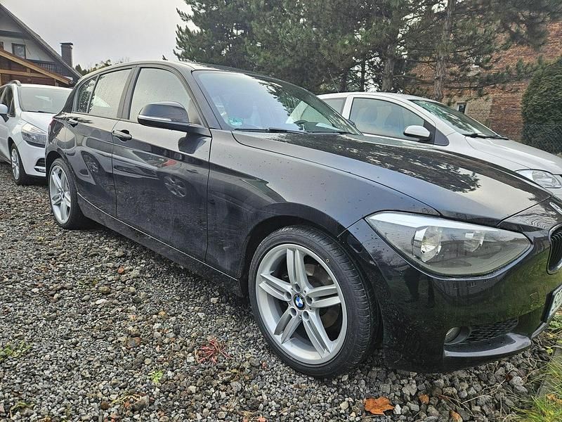 Używany BMW 116 Sport Line 136 KM (100 kW) 2012 Czarny (metalik) Hatchback