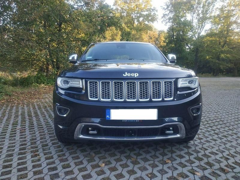Szary Używany 2015 Jeep Grand Cherokee SUV | 97 000 zł - Obraz 1/4