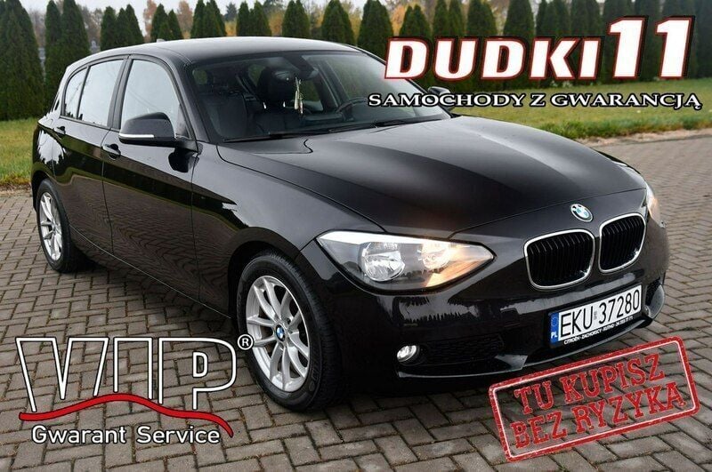 Czarny Używany 2013 BMW 116 Hatchback | 26 900 zł (Uczciwa cena) - Obraz 1/4