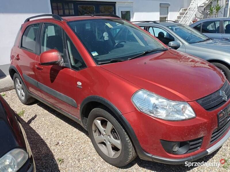 Pomarańczowy Używany 2007 Suzuki SX4 SUV | 14 000 zł (Uczciwa cena) - Obraz 1/4