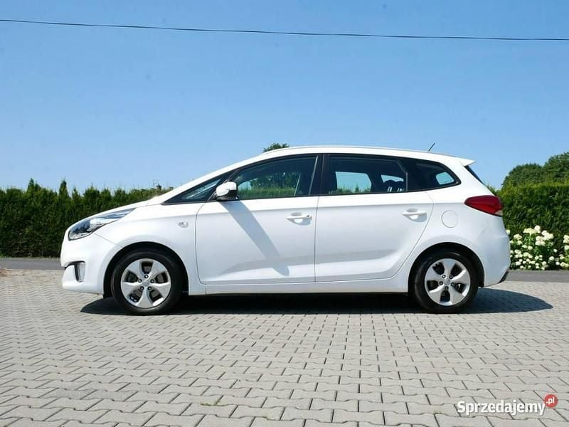 Biały Używany 2014 Kia Carens 2 Minivan | 35 400 zł (Uczciwa cena) - Obraz 1/4