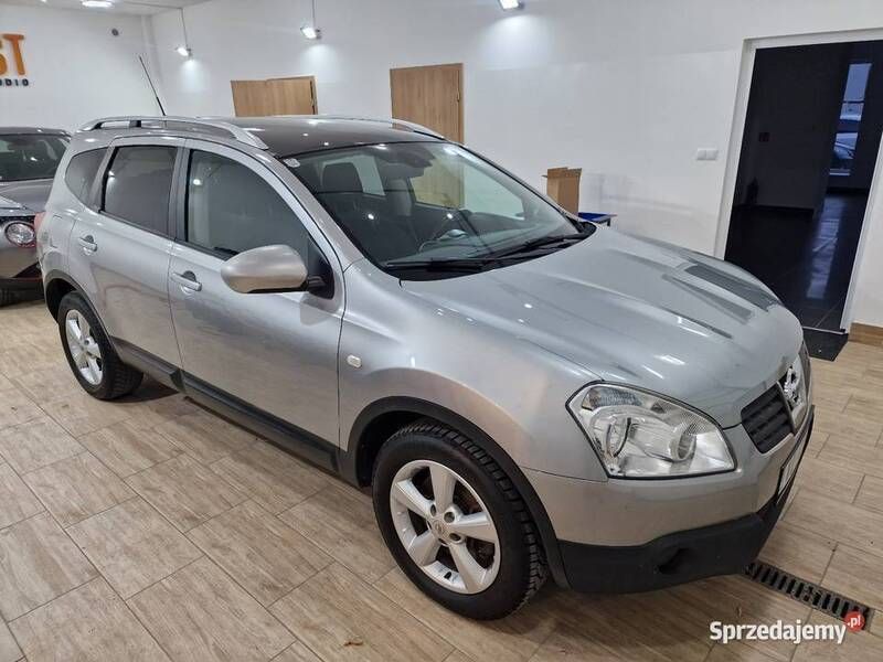 Szary Używany 2009 Nissan Qashqai +2 SUV | 23 700 zł (Uczciwa cena) - Obraz 1/4