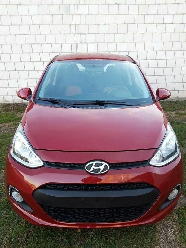 Czerwony Używany 2014 Hyundai i10 Hatchback | 20 900 zł (Uczciwa cena) - Obraz 1/4