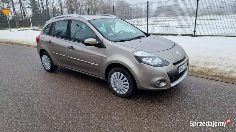 Używany Renault Clio II 86 KM (63 kW) 2009 Beżowy Kombi