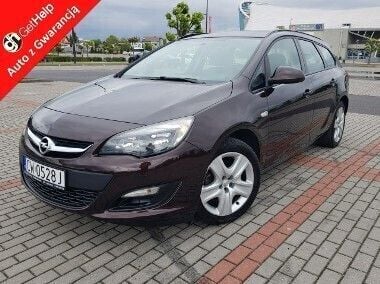 Brązowy Używany 2012 Opel Astra Kombi | 23 900 zł (Uczciwa cena) - Obraz 1/4