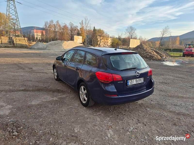 Granatowy Używany 2011 Opel Astra Kombi | 9500 zł (Uczciwa cena) - Obraz 1/4