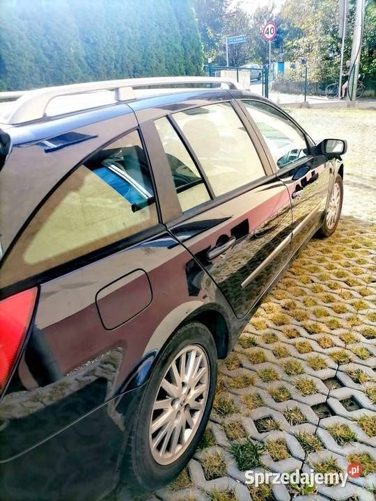 Granatowy Używany 2007 Renault Laguna II Kombi | 12 500 zł - Obraz 1/4