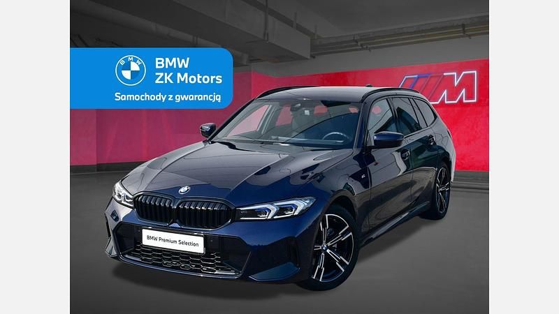 Niebieski tanzanite bmw individual metalizowany Używany 2023 BMW 320 Comfort Edition Kombi | 207 900 zł - Obraz 1/3