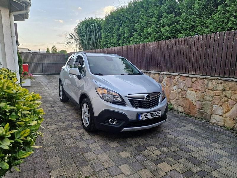 Srebrny (metalik) Używany 2016 Opel Mokka Cosmo SUV | 39 900 zł (Uczciwa cena) - Obraz 1/4