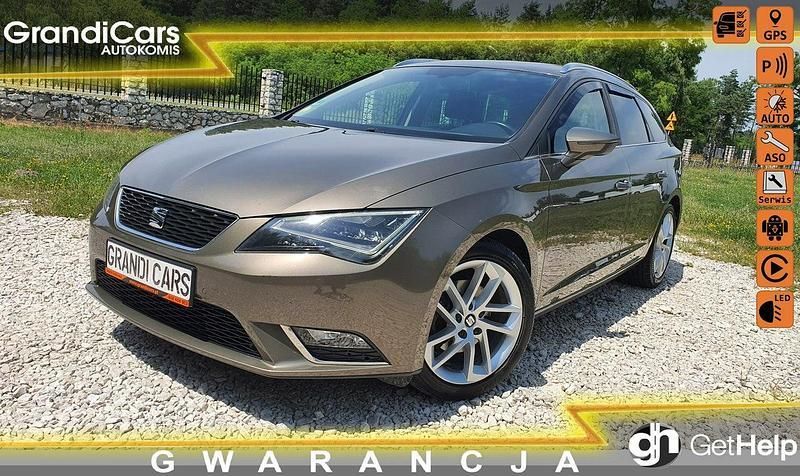Brązowy (metalik) Używany 2014 Seat Leon Kombi | 32 700 zł (Uczciwa cena) - Obraz 1/4