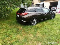 Brązowy Używany 2016 Honda Civic Executive Kombi | 74 500 zł
