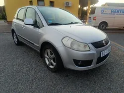 Srebrny Używany 2006 Suzuki SX4 Hatchback | 15 200 zł (Uczciwa cena)