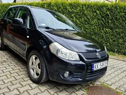 Czarny Używany 2006 Suzuki SX4 Exclusive Hatchback | 13 900 zł (Dobra cena)