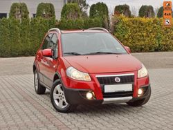 Pomarańczowy Używany 2008 Fiat Sedici SUV | 17 800 zł (Uczciwa cena)